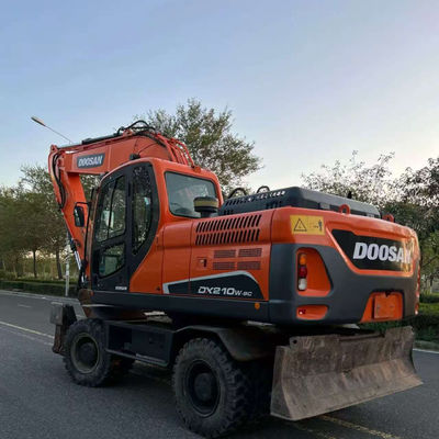 ドーサン DX210W 中古車輪掘削機 水力ミニ中古掘削機 20100 kg